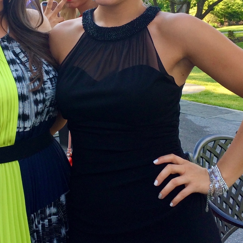Black Xscape Evening Gown With Sheer Sweetheart Top
